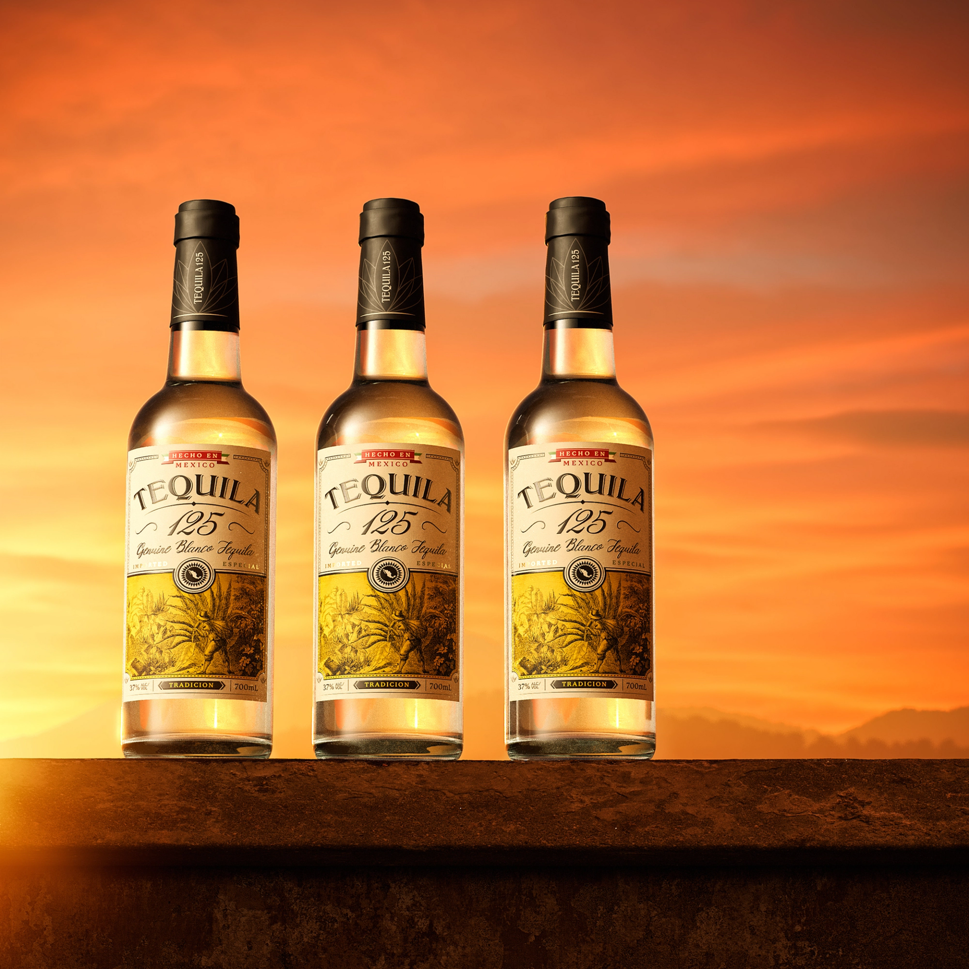 Three bottles of Tequila 125 featuring Sydney packaging design agency Our Revolution, in front of a warm sunset scene