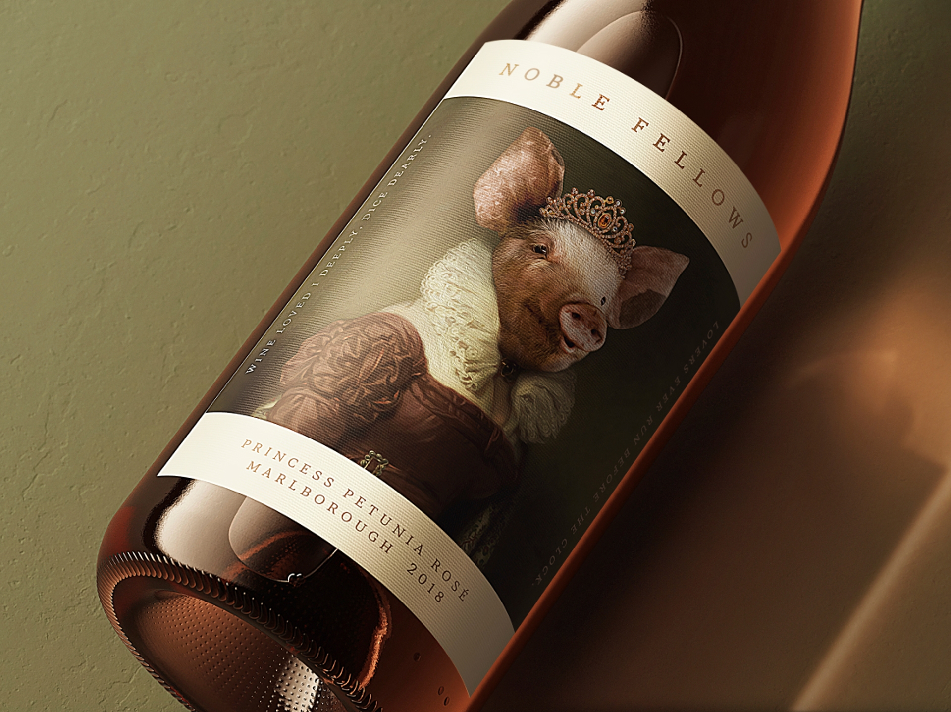 Close-up of Noble Fellows “Princess Petunia Rosé Marlborough 2018” wine label design by packaging design agency Our Revolution featuring a wine label with a painted portrait of a pig with a tiara in a royal dress