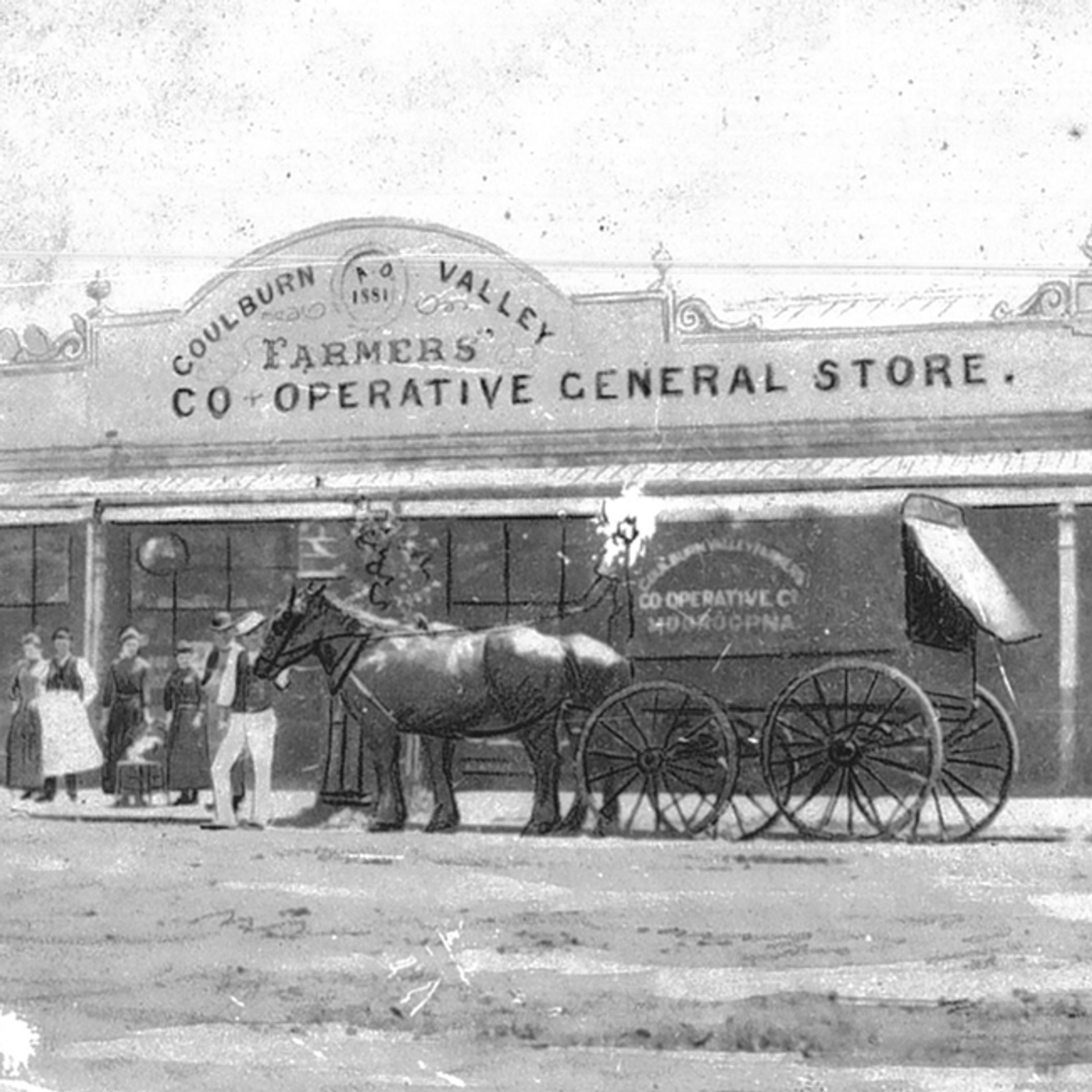 Grainy black and white photograph of horse carriage in front of Goulburn Valley Farmers’ Co-Operative General Store